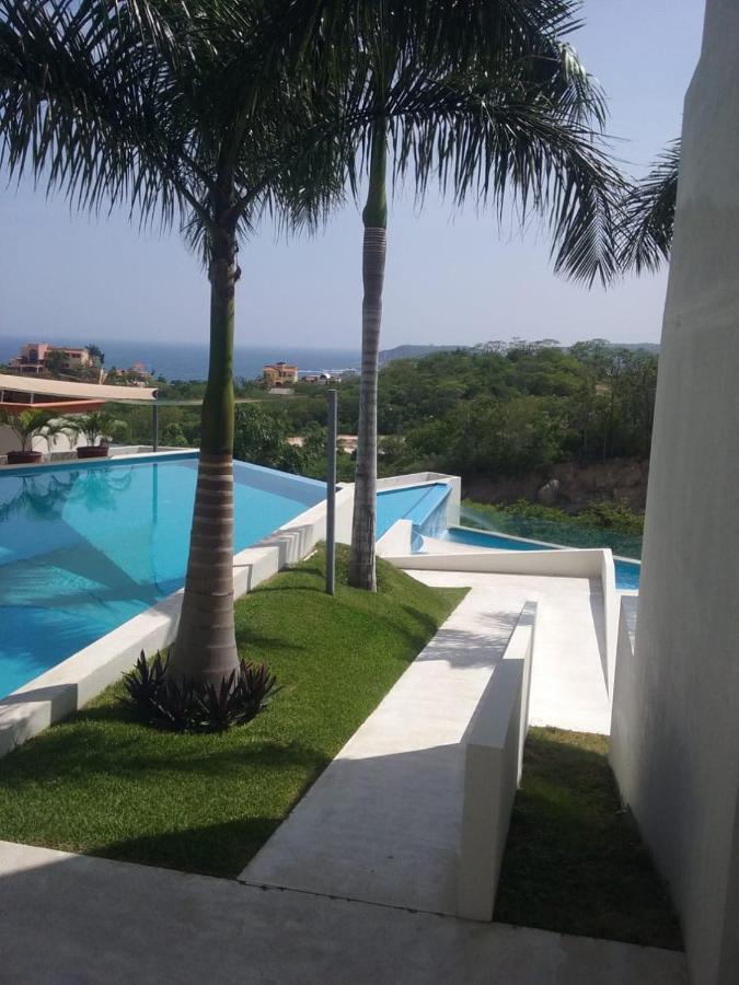 Puntagaviota Apartment Санта Крус Уатулко Екстериор снимка